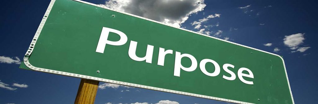 A close up of a road sign that reads "purpose", representing the purpose gained by working with bipolar therapist in Atlanta, GA. Learn more about bipolar disorder treatment in Atlanta, GA by searching "bipolar treatment online in Atlanta, GA" today.